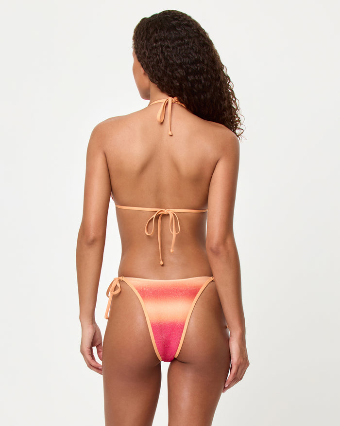 Back view of a model wearing the LSPACE Ocaso Banning Bikini Top and Banning Bikini Bottom.