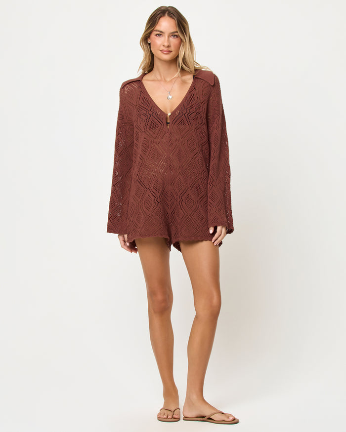 Front view of model wearing the LSPACE Golden Daze Romper in cafe, a short romper with a square neckline and short sleeves.