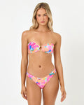 Front view of a model wearing the LSPACE Flower Play Jasper Bikini Top with a center ring cutout, paired with matching Flower Play Rocky Bikini Bottoms.