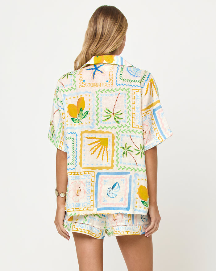 LSPACE La Mer Short and Shirt in Wish You Were Here print, back view on model.