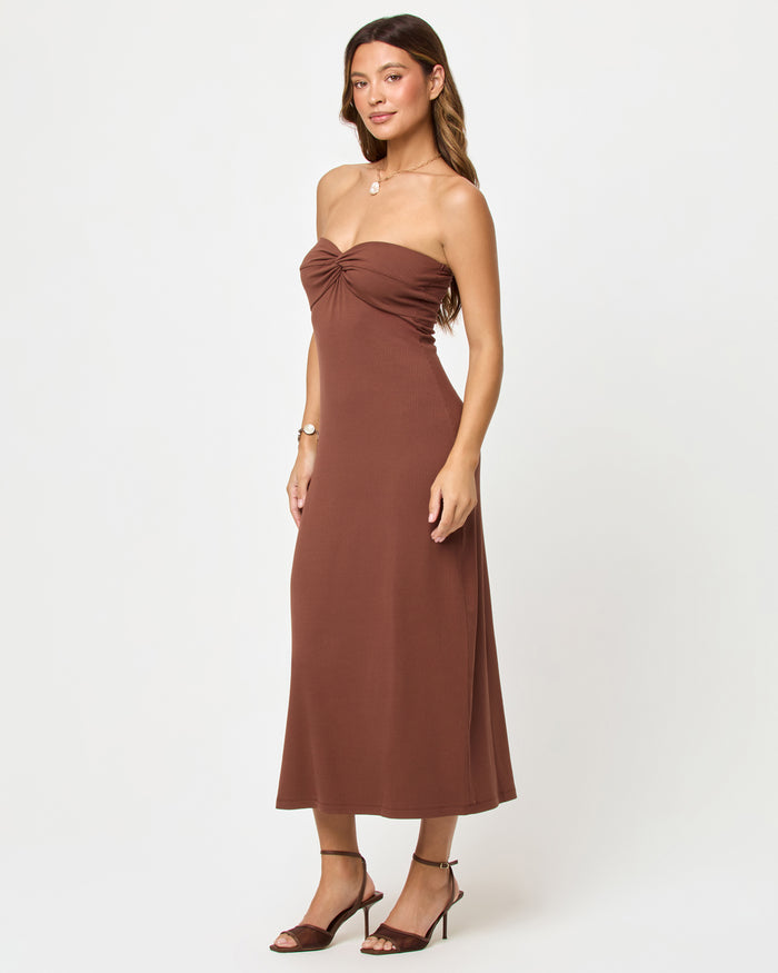 Side view of model wearing the LSPACE Lisette Dress in cafe.