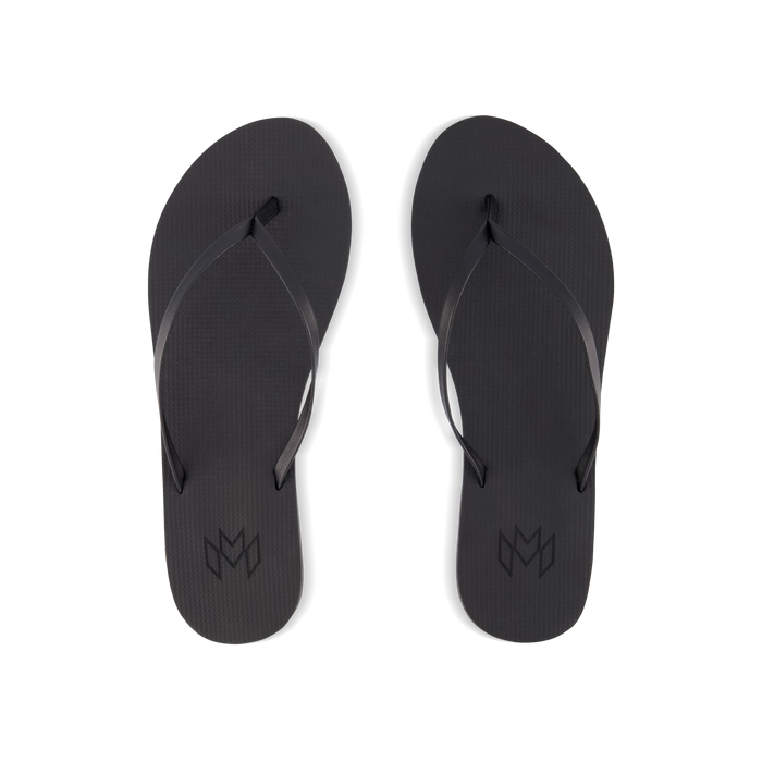 Lux Noir minimalist flip flop with thin strap and arch support in black