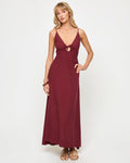 Front view of a model wearing the LSPACE Mabel Maxi Dress in sangria, featuring thin spaghetti straps, a deep V-neckline with keyhole cutout and tie detail at the bust, and a flowing full-length silhouette.