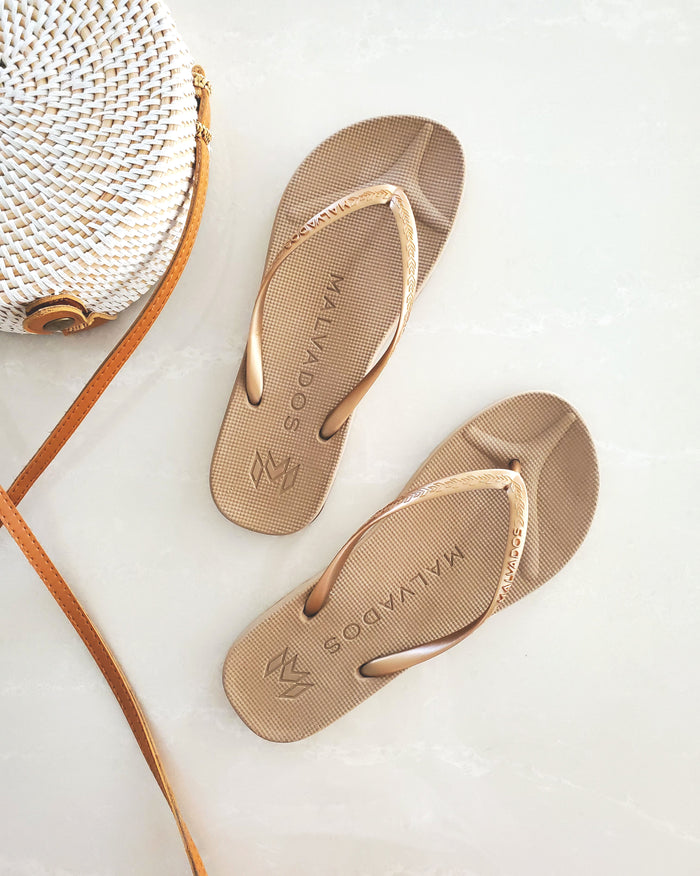 Playa Tequila Sunrise beach flip flop waterproof sandal with toe pillow, arch support and toe post anchor in gold
