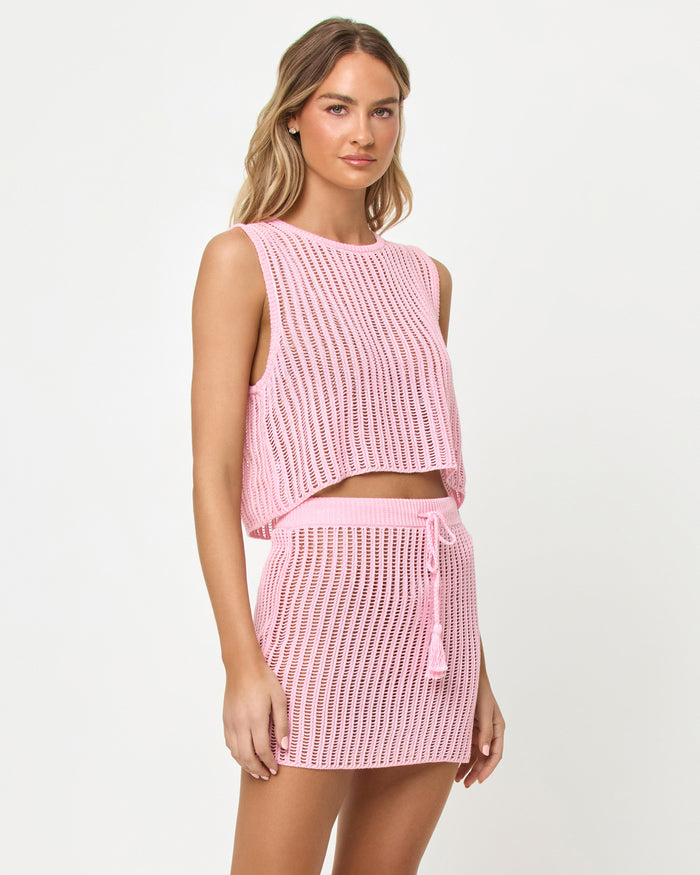 LSPACE Sander Top and Skirt in Rosewater, three-quarter front view on model.