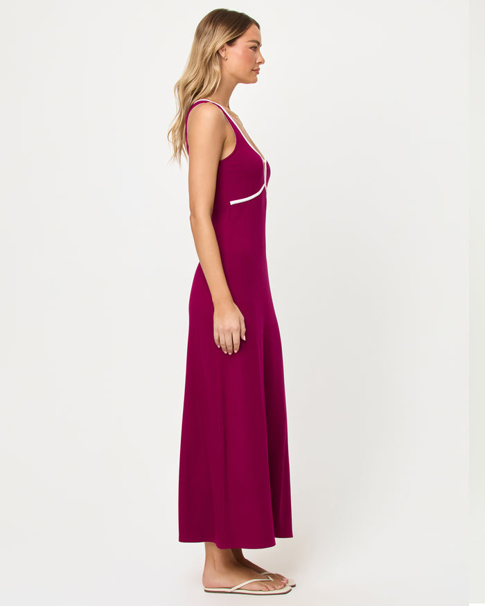 Side view of model wearing the LSPACE Sayge Maxi in berry jam cream.
