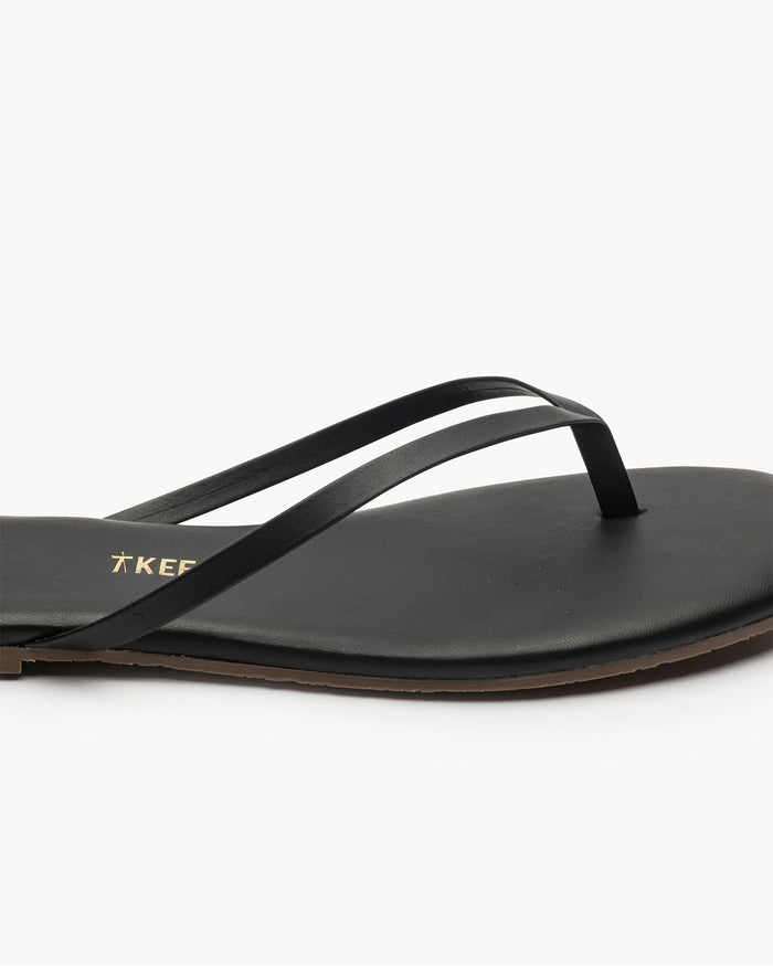 Side view of the TKEES Square Toe Lily Sandals in black.