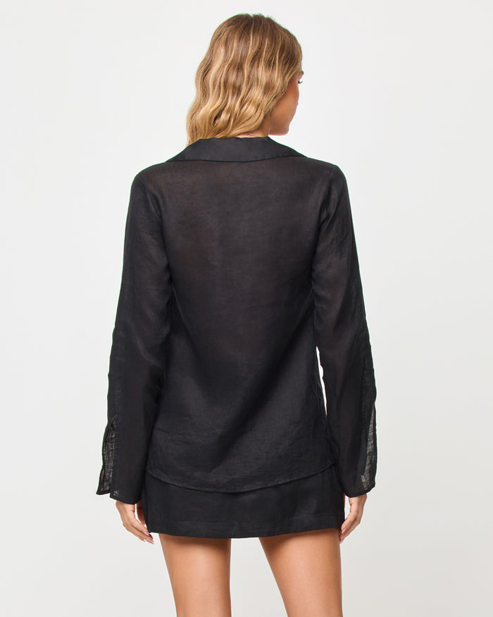 Side view of model wearing the LSPACE Venice Shirt and Skort.
