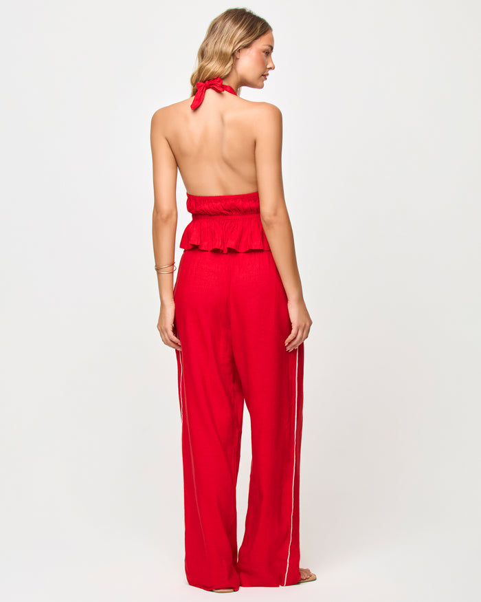 Back view of model wearing the LSPACE x The Salty Blonde August Top in flame.