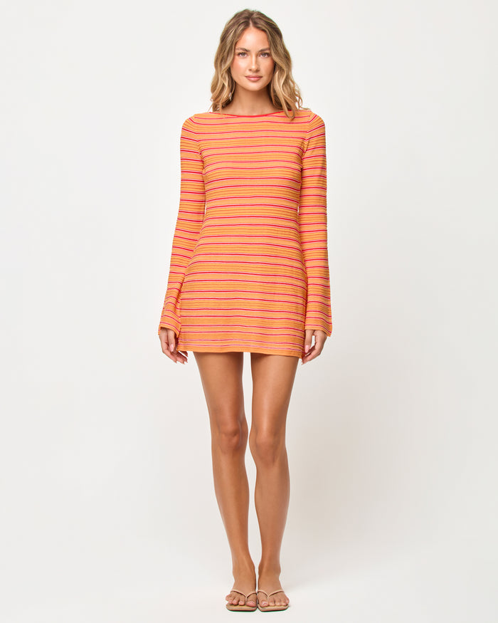 Front view of model wearing the LSPACE x The Salty Blonde Tita Dress in chili pepper stripe.